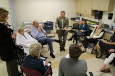 University of Virginia Doctor Tim Short debriefing geriatric simulation group